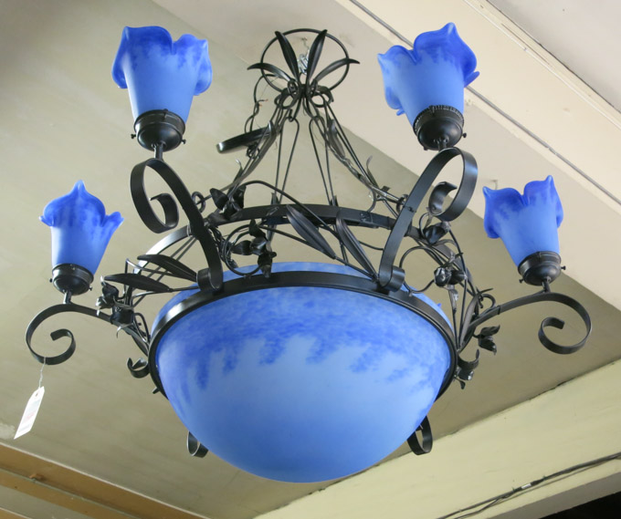 Appraisal: BLUE ART GLASS AND BLACK METAL CHANDELIER a round fixture