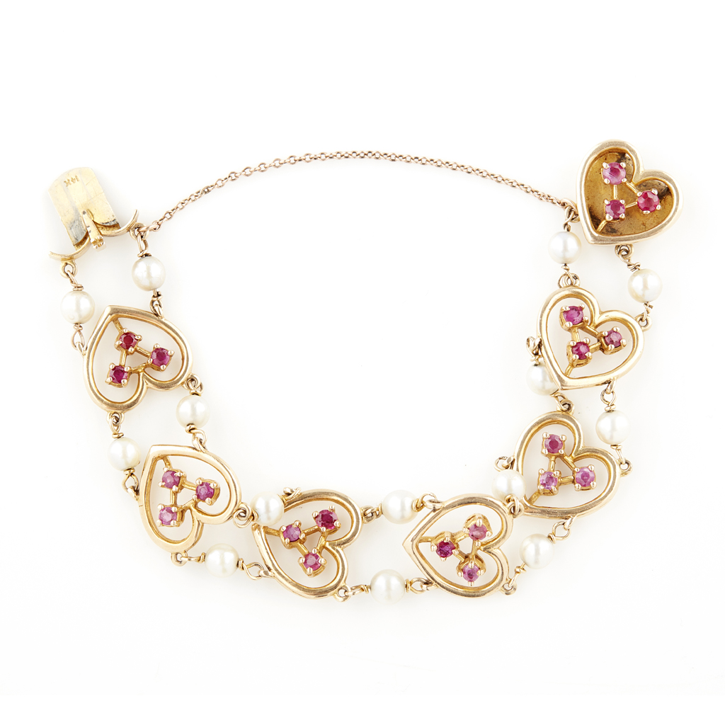 Appraisal: A ruby and pearl set bracelet composed of open heart