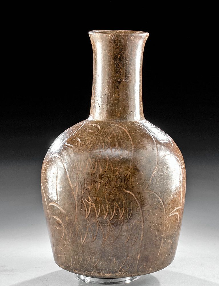 Appraisal: Chavin Brownware Bottle w Incised Eagle Motif Originally Listed At