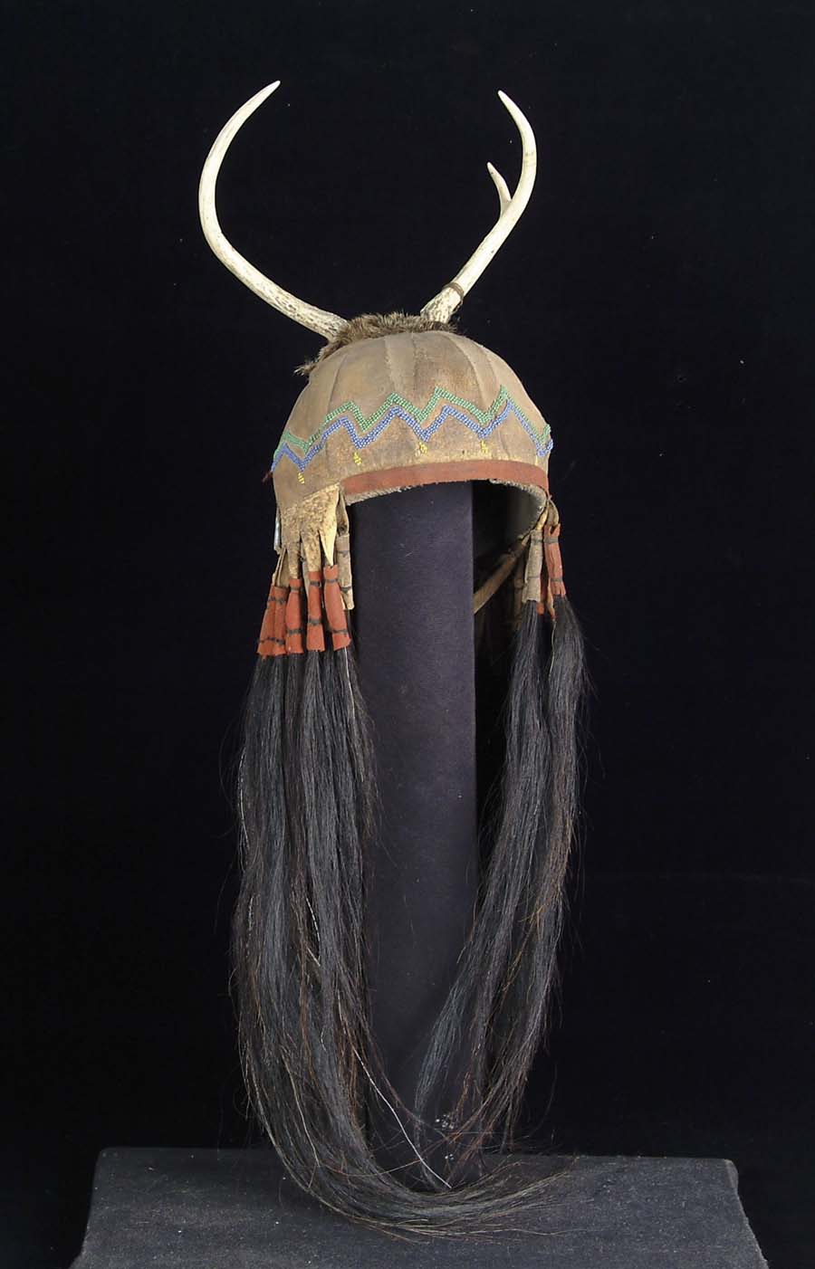 Appraisal: PLAINS OR PLATEAU DEER ANTLER HEADDRESS CIRCA Felt hat base