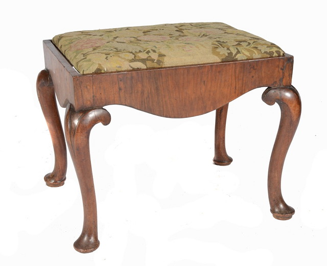 Appraisal: A GEORGIAN WALNUT STOOL of rectangular form on cabriole supports