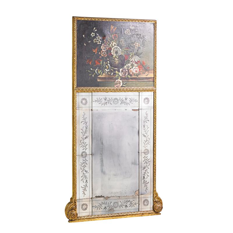 Appraisal: TRUMEAU MIRROR Giltwood frame with floral oil on canvas panel