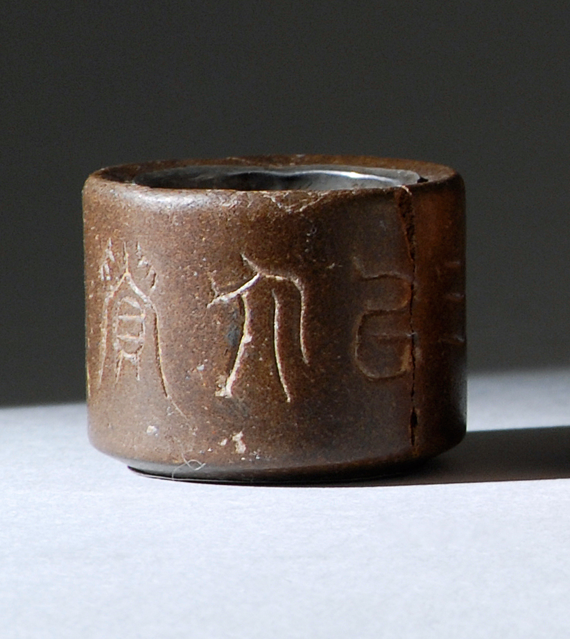 Appraisal: ENGRAVED WOOD SCHOLAR'S RING th th CenturyWith engraved calligraphy and