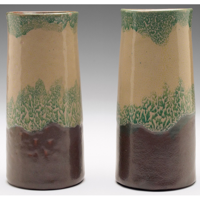 Appraisal: Saturday Evening Girls vases pair cylindrical shape with a stylized