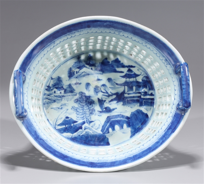 Appraisal: Chinese blue and white porcelain basket with molded handles and