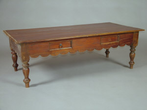 Appraisal: A stained pine coffee table th century the four plank