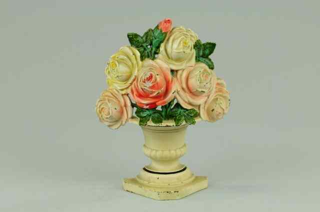 Appraisal: ROSES DOORSTOP Hubley cast iron lovely pastel arrangement simulated in