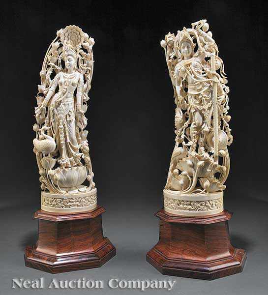 Appraisal: A Pair of Indian Highly Carved Ivory Figures of the