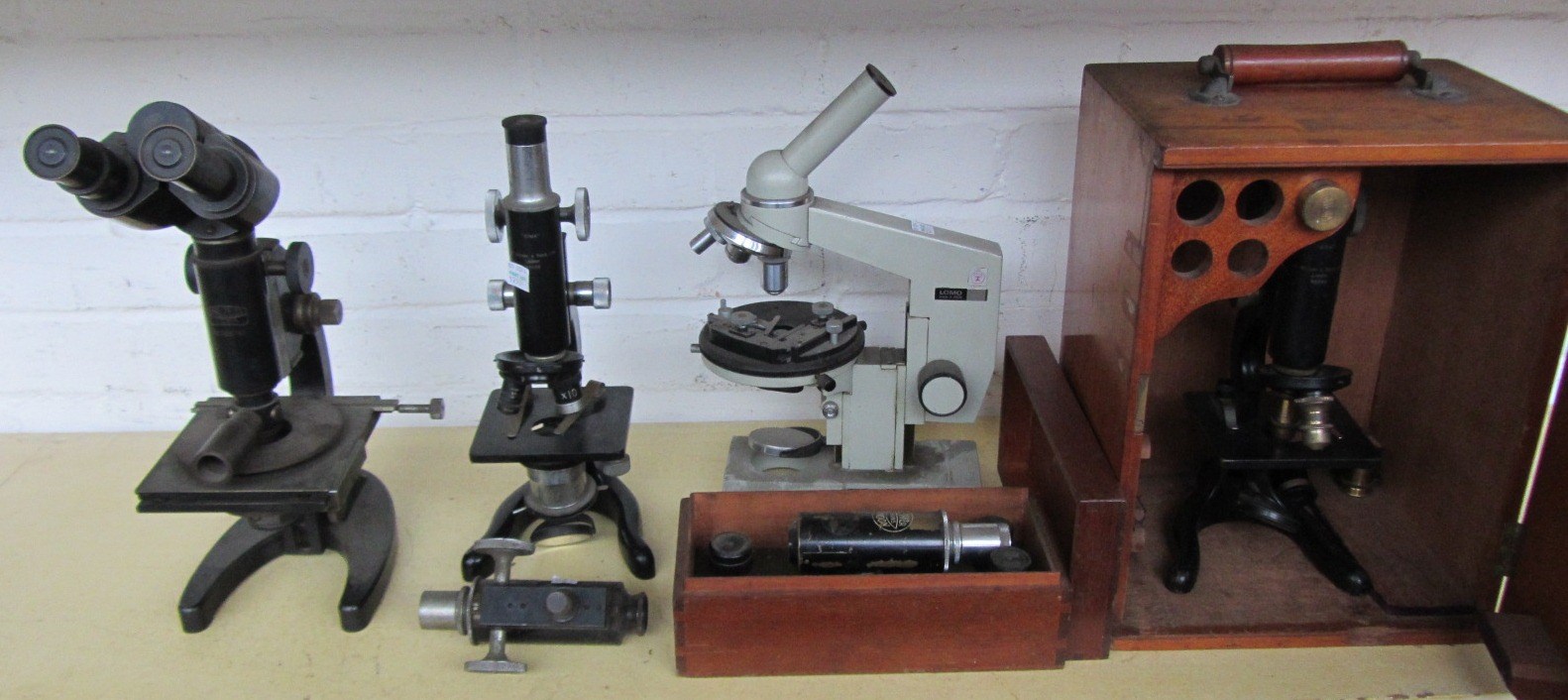 Appraisal: A Watson Sons ebonised brass microscope 'Mima' another similar a