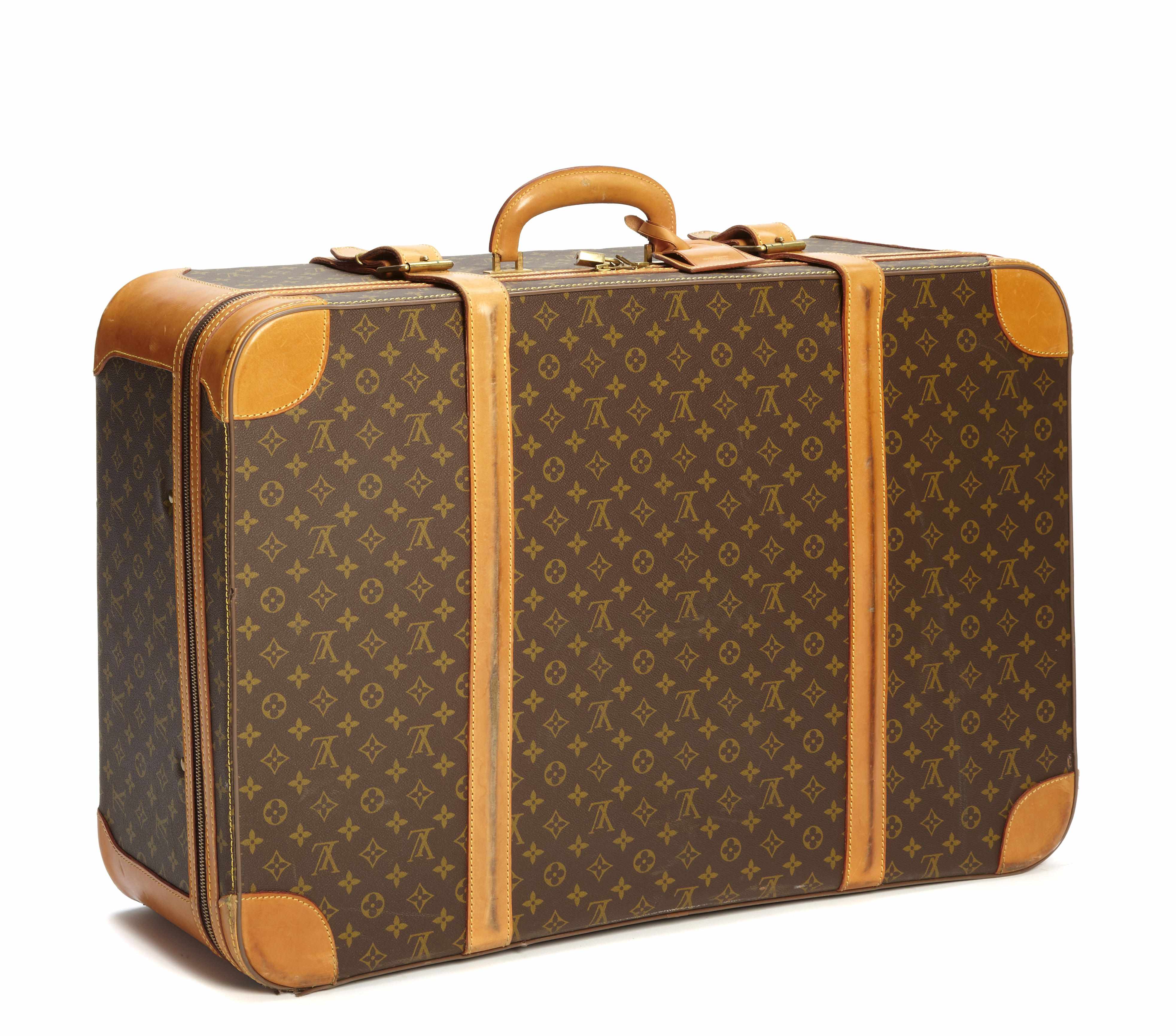 Appraisal: A Louis Vuitton large soft sided suitcase size in x