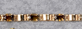 Appraisal: HONEY SAPPHIRE BRACELET k rose gold bracelet with eight oval