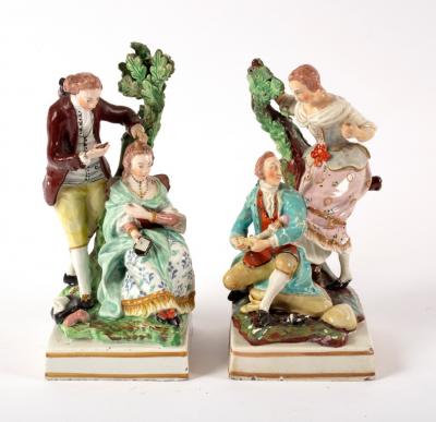 Appraisal: A pair of English pearlware figures circa of a cobbler