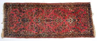 Appraisal: Hallway Runner Rug Floral motifs on red ground