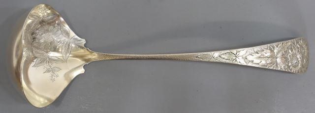 Appraisal: American Aesthetic Movement sterling silver ladle handle with repousse sunflowers