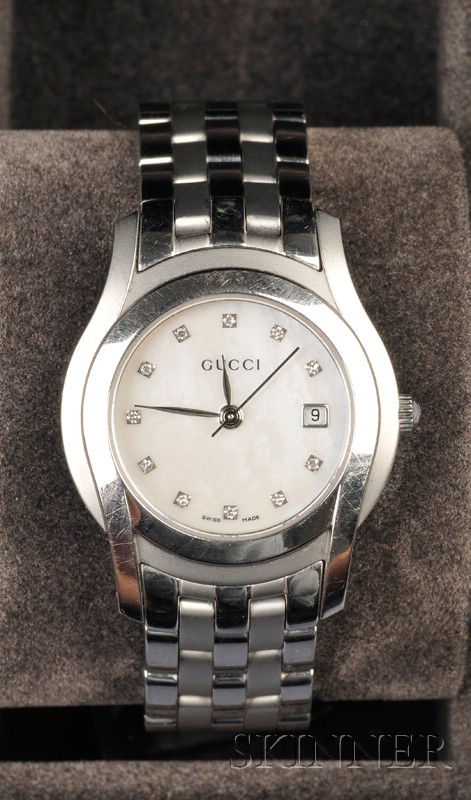 Appraisal: Lady's Stainless Steel Wristwatch Gucci the mother-of-pearl dial with diamond