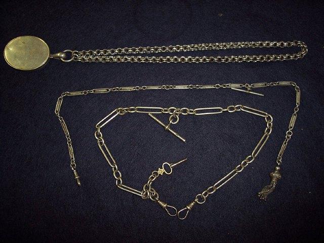 Appraisal: A silver watch chain with fetter-and-three links another with tassel