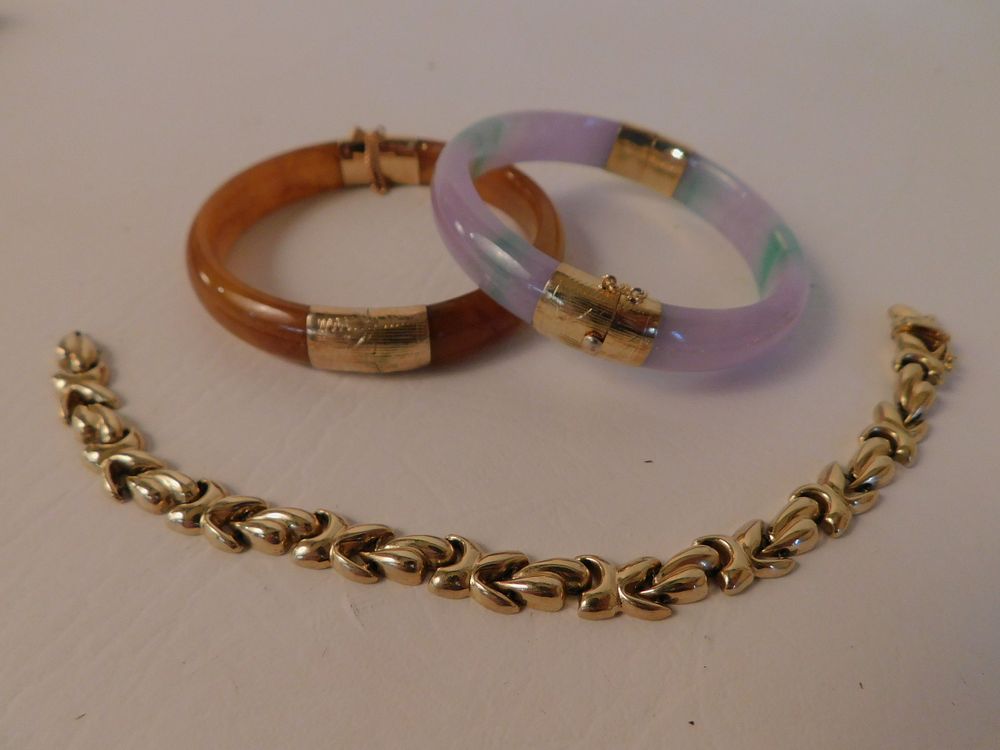 Appraisal: THREE BRACELETS WITH K GOLD Lot bracelets jade bangles with