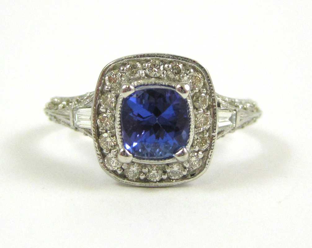 Appraisal: TANZANITE DIAMOND AND EIGHTEEN KARAT GOLD RING The white gold