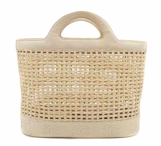 Appraisal: A Chanel Tan Straw and Leather Beach Tote together with