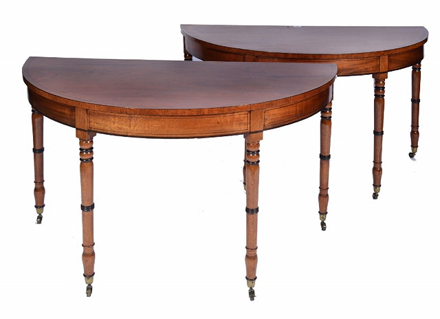 Appraisal: A PAIR OF EARLY TH CENTURY HALF ROUND MAHOGANY TABLES