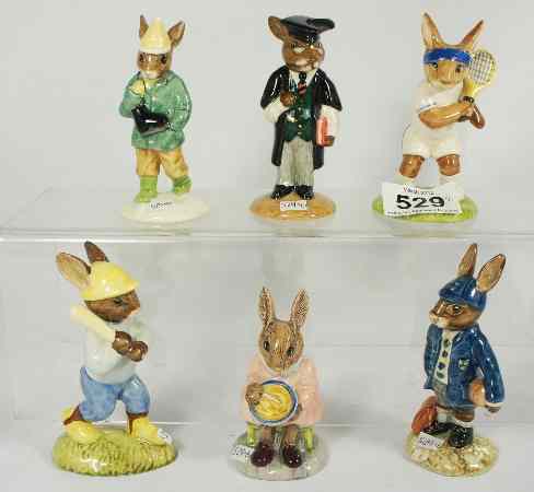 Appraisal: Royal Doulton Bunnykins Figures Boy Skater DB Schoolboy DB Ace