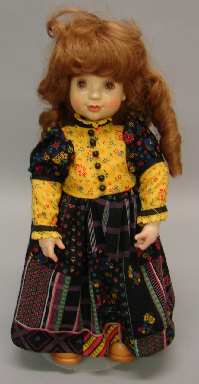 Appraisal: All wood ANRI female doll designed by Sarah Kay Auburn