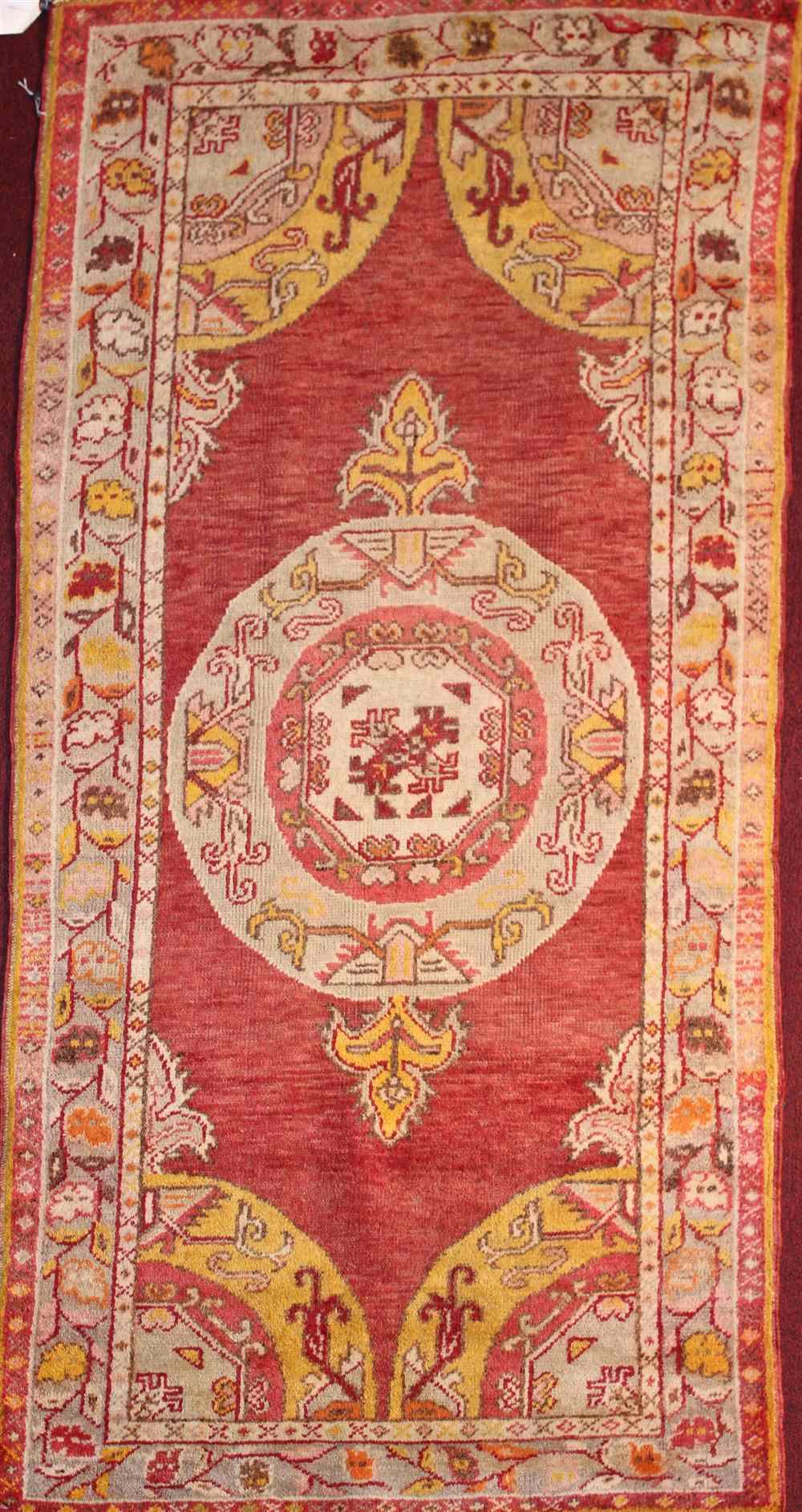 Appraisal: TURKISH OUSHAK WOOL RUG approx ' x ' '' retail