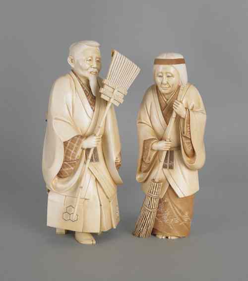 Appraisal: Pair of Japanese carved elephant ivory of a man and