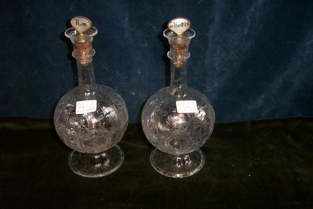 Appraisal: A pair of th century bulbous decanters with high quality