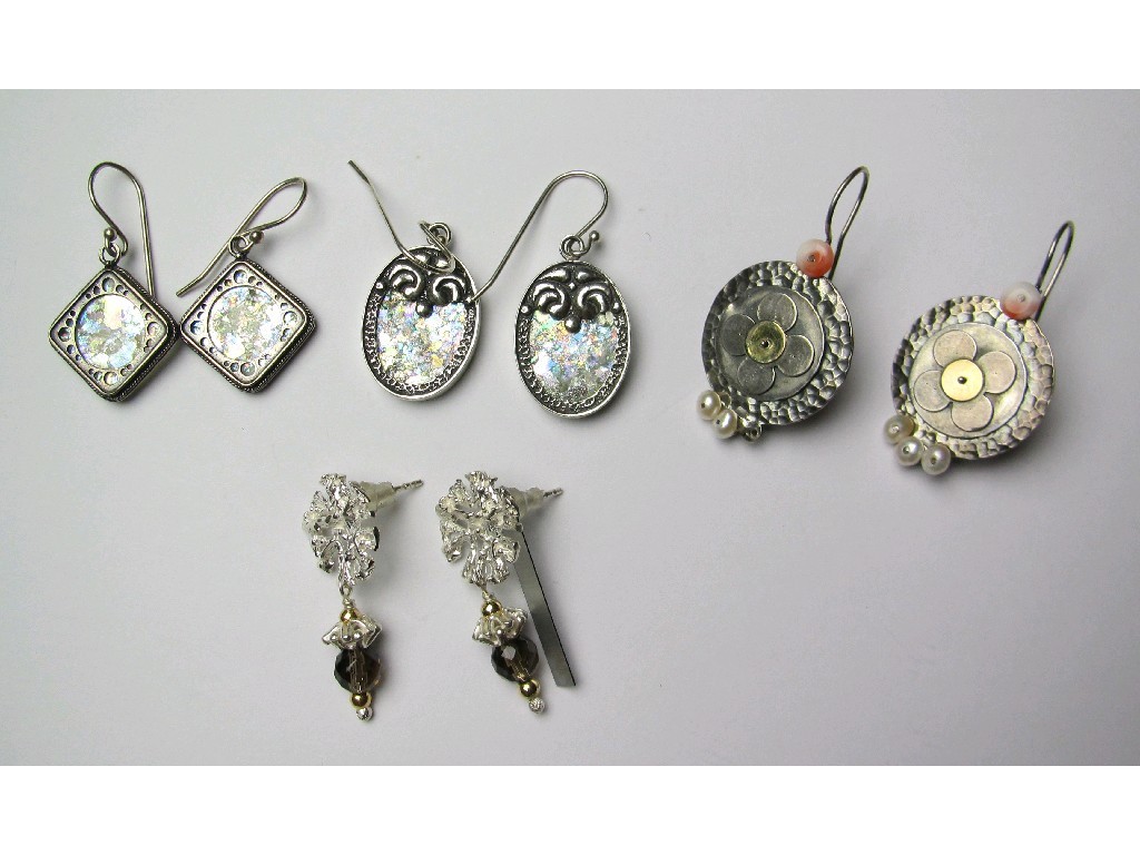 Appraisal: Four pairs of silver earrings