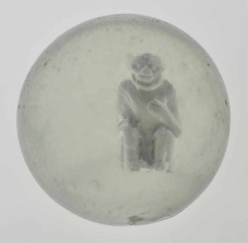 Appraisal: Monkey Sitting with Hand on Chest Sulphide Marble Description Imp