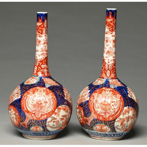 Appraisal: Two Japanese Imari drumstick vases with matching decoration Meiji period