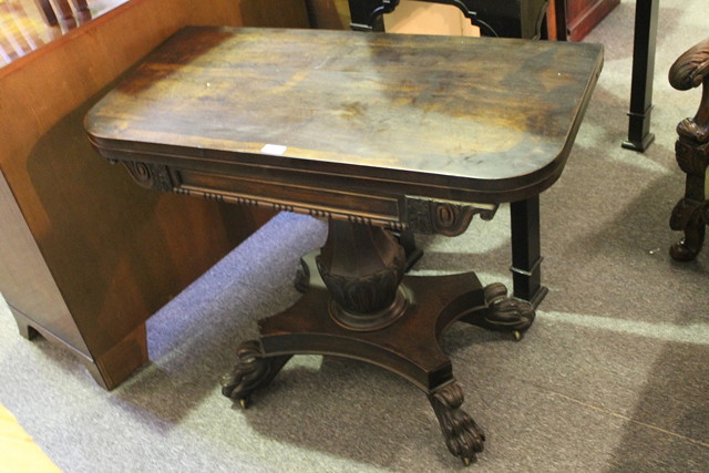 Appraisal: A TH CENTURY ROSEWOOD FOLD-OVER TOP TEA TABLE with tapering