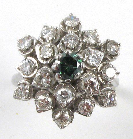 Appraisal: GREEN DIAMOND AND FOURTEEN KARAT GOLD RING centering a round-cut