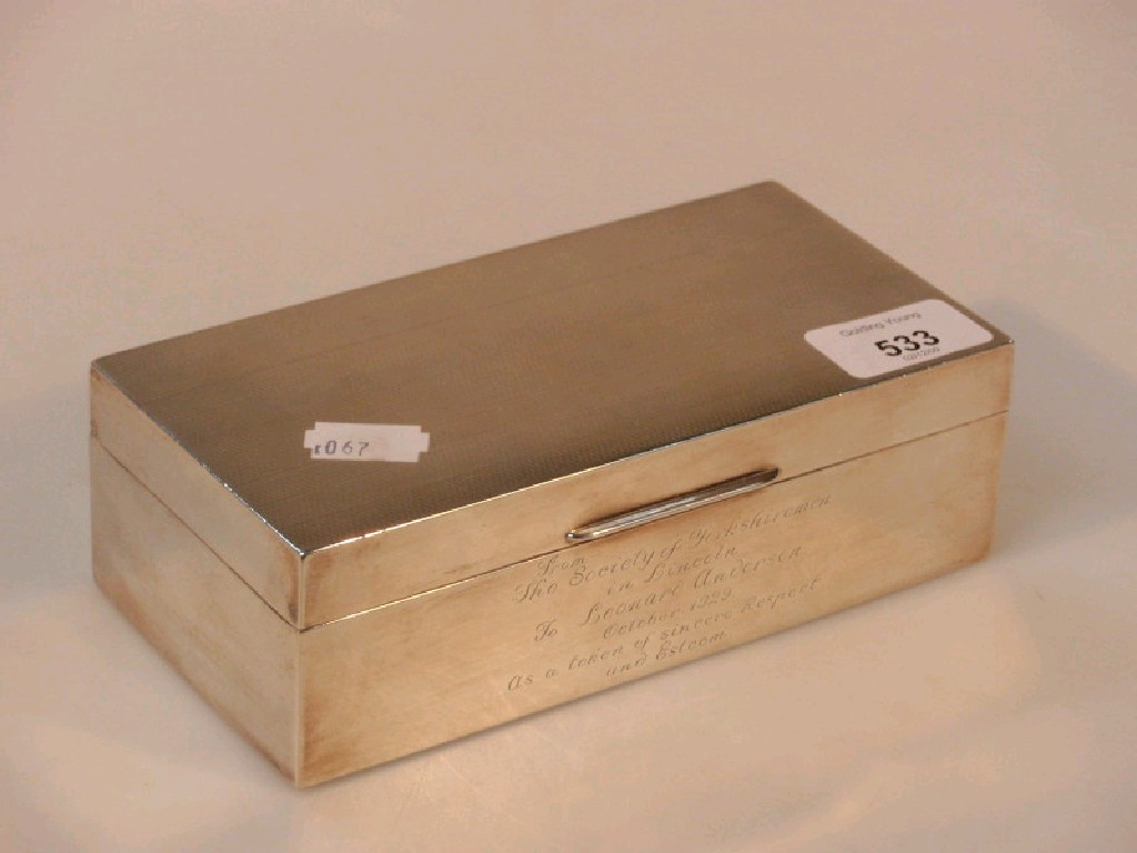 Appraisal: A George V machine turned silver cigarette case inscribed From