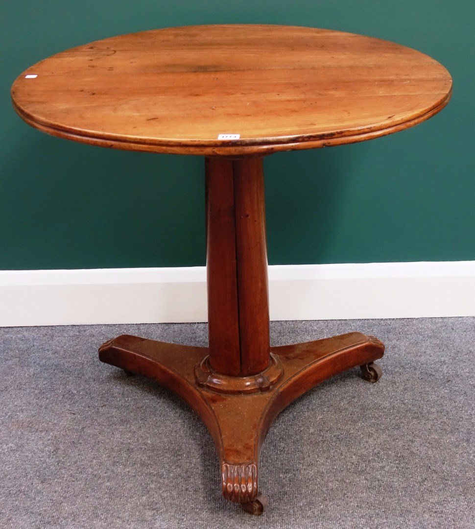 Appraisal: An early th century French fruitwood occasional table the circular