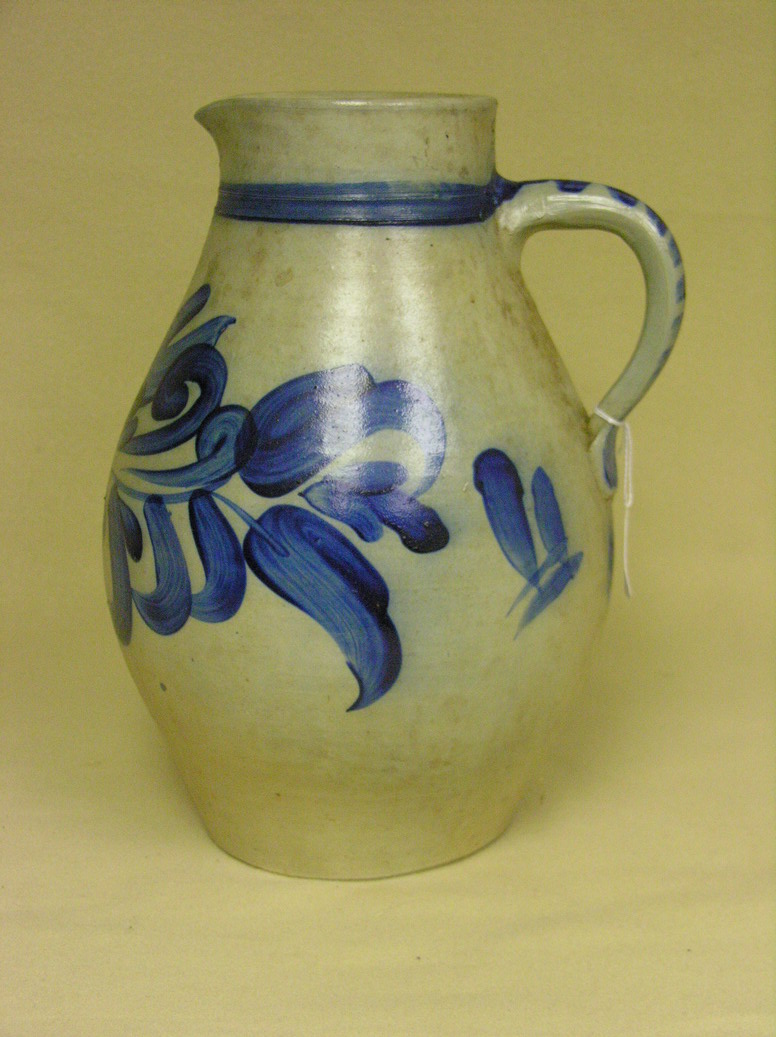 Appraisal: VINTAGE COBALT DECORATED STONEWARE PITCHER Free style floral with a