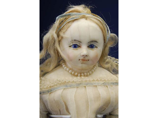 Appraisal: Slit Head Wax Lady England ca wax shoulder head blue