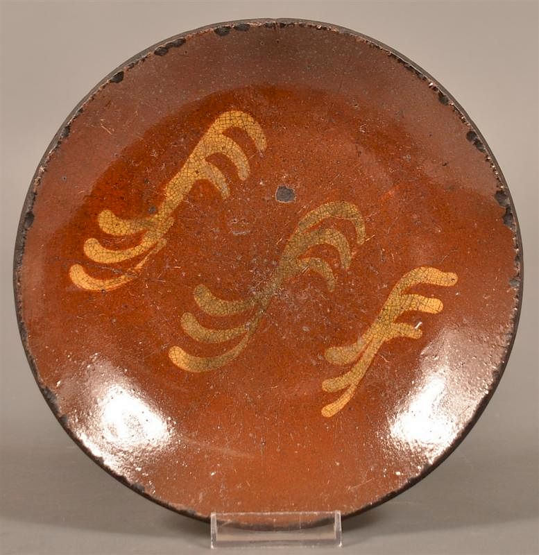 Appraisal: PA th Century Glazed Redware Plate Pennsylvania th Century Glazed