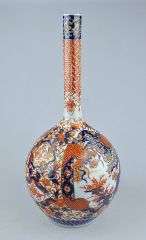 Appraisal: A th century Japanese Imari porcelain bottle vase with narrow