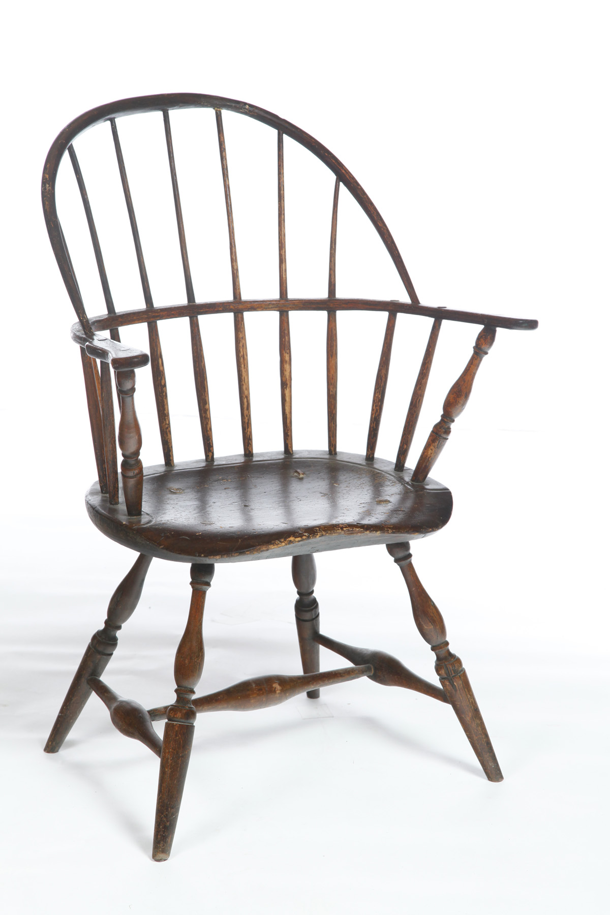 Appraisal: AMERICAN SACK-BACK WINDSOR ARMCHAIR Late th century mixed woods Baluster