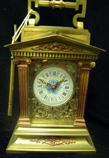 Appraisal: A half-hour repeating carriage clock the architectural case with swing