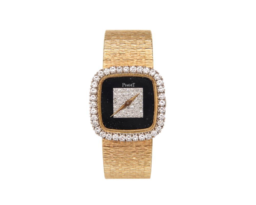 Appraisal: PIAGET K Gold and Diamond Wristwatch the black dial pave-set