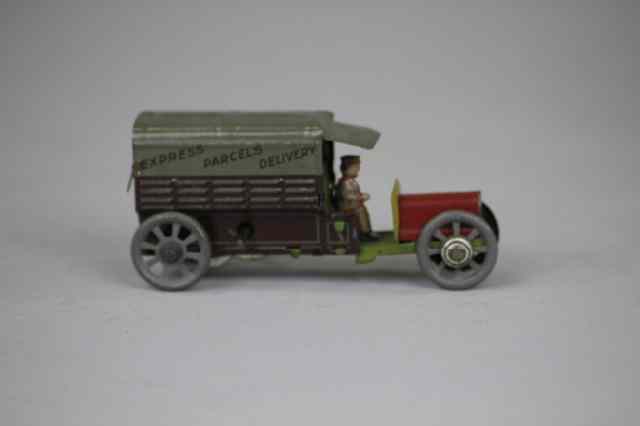 Appraisal: PARCEL DELIVERY TRUCK PENNY TOY Distler Germany lithographed tin enclosed