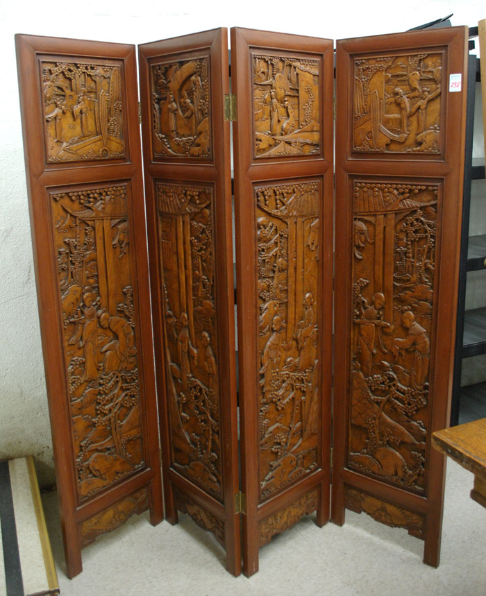 Appraisal: HAND CARVED PICTORIAL TEAKWOOD FLOOR SCREEN Chinese th century one