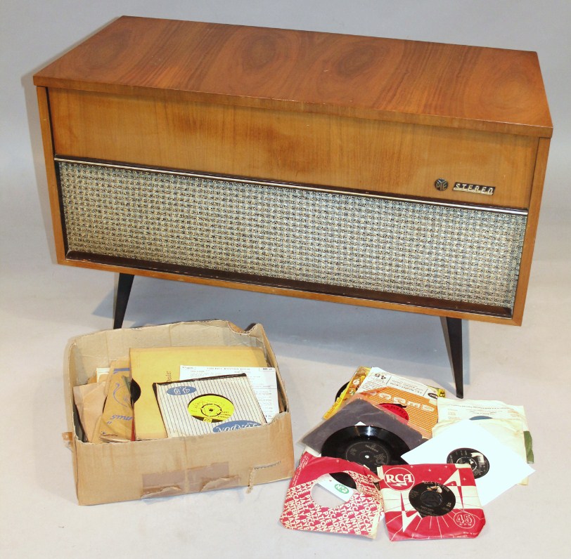 Appraisal: A Pye retro teak radiogram of shaped rectangular outline with