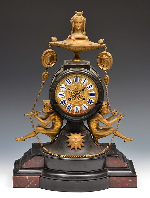 Appraisal: A th Century French mantel clock the cast gilt dial