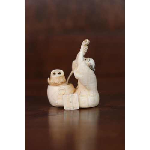 Appraisal: Ivory netsuke depicting a man with teapot raised arms approx