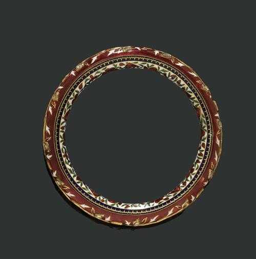 Appraisal: PAIR OF ENAMEL BRACELETS India Decorative gold bracelets with round