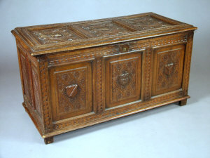 Appraisal: An armorial carved oak coffer late th early th century